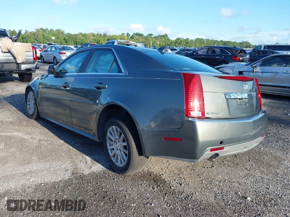 2011 Cadillac CTS Luxury with VIN 1G6DE5EY5B0154563, listed as a IAAI auction lot 36806985 with 92,635 mi miles and . Bid and sale history available at DreamBid. Image 3.