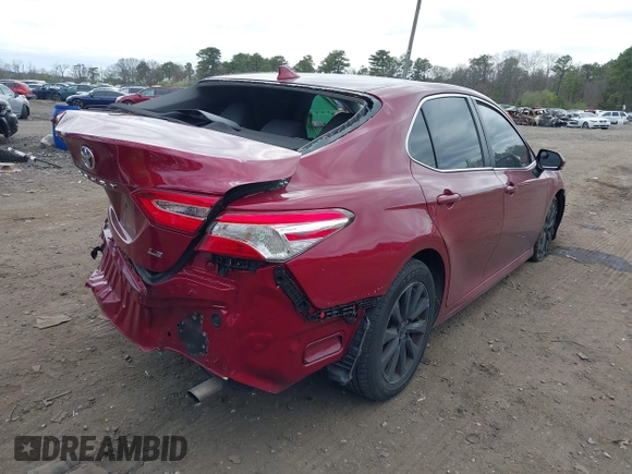 2020 Toyota Camry LE with VIN 4T1C11AK4LU920044, listed as a IAAI auction lot 42084112 with 96,745 mi miles and . Bid and sale history available at carsss.com. Image 4.