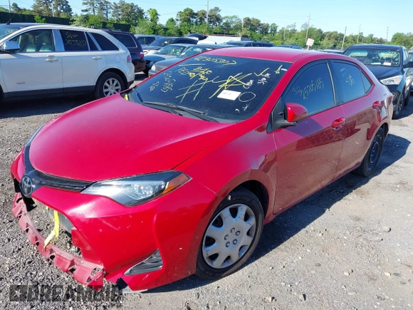 2018 Toyota Corolla L z VIN 2T1BURHE6JC057196, wystawiony jako IAAI lot #42305307 z przebiegiem 106 670 mil mil oraz . Historia ofert i sprzedaży dostępna na DreamBid. Obrazek 2.