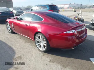 2008 Jaguar XK with VIN SAJWA43C089B22700, listed as a IAAI auction lot 41585734 with 67,946 mi miles. Bid and sale history available at carsss.com. Image 3.