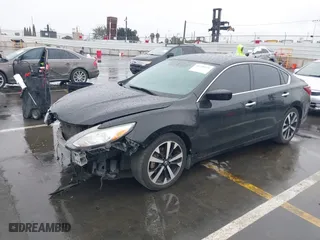 2018 Nissan Altima 2.5 SV with VIN 1N4AL3AP9JC117719, listed as a IAAI auction lot 41720521 with 103,541 mi miles. Bid and sale history available at carsss.com. Image 18.