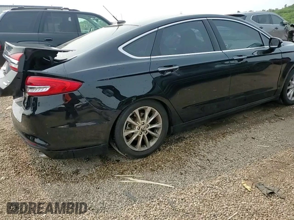 2017 Ford Fusion SE с VIN 3FA6P0HD4HR230641, выставлен на аукционе Copart как лот 59364955 с пробегом 147 612 миль миль и Списание • Salvage title. История ставок и продаж доступна на DreamBid. Изображение 14.
