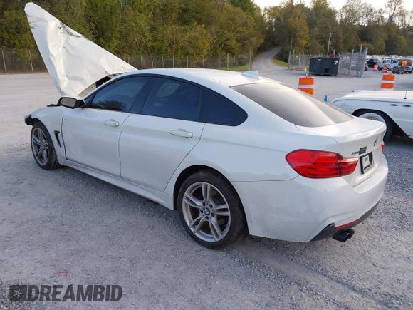 2015 BMW 4 Series 428i xDrive z VIN WBA4C9C57FD330866, wystawiony jako IAAI lot #40574326 z przebiegiem 123 726 mil mil oraz . Historia ofert i sprzedaży dostępna na DreamBid. Obrazek 3.