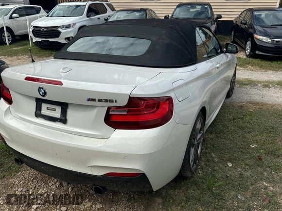 2015 BMW 2 Series M235i with VIN WBA1M1C56FV393758, listed as a Copart auction lot 81534244 with 51,015 mi miles and Salvage Title. Bid and sale history available at carsss.com. Image 4.