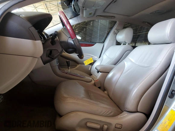 2002 Lexus ES 300 with VIN JTHBF30G720079044, listed as a Copart auction lot 59610445 with 145,310 mi miles and Salvage title. Bid and sale history available at DreamBid. Image 7.