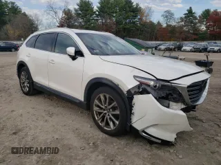 2016 Mazda CX-9 Grand Touring with VIN JM3TCBDY0G0125548, listed as a Copart auction lot 79030064 with 150,056 mi miles and Salvage title. Bid and sale history available at DreamBid. Image 4.