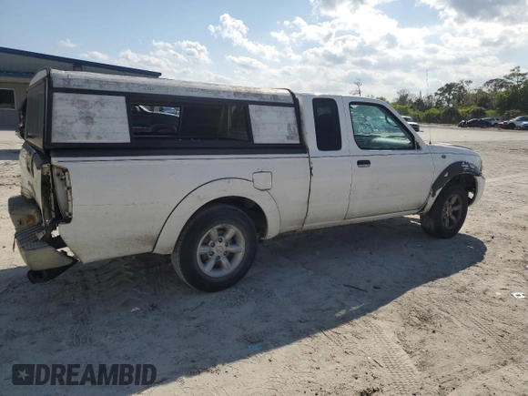 2004 Nissan Frontier XE with VIN 1N6DD26T04C450297, listed as a Copart auction lot 47326415 with 220,266 mi miles and Salvage title. Bid and sale history available at DreamBid. Image 3.