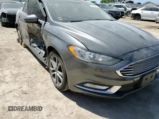 2017 Ford Fusion Hybrid SE с VIN 3FA6P0LU2HR258767, выставлен на аукционе Copart как лот 58069375 с пробегом 152 049 миль миль и Списание • Salvage title. История ставок и продаж доступна на DreamBid. Изображение 13.