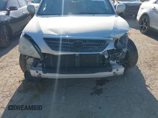 2006 Lexus RX 400h with VIN JTJGW31U860003878, listed as a IAAI auction lot 42226980 with 197,783 mi miles and . Bid and sale history available at DreamBid. Image 6.