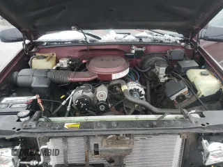 1995 GMC Sierra 1500 z VIN 2GTEK19K2S1542315, wystawiony jako Copart lot #42764275 z przebiegiem 305 402 mil mil oraz Szkody całkowita. Historia ofert i sprzedaży dostępna na DreamBid. Obrazek 11.