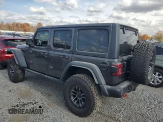2024 Jeep Wrangler Rubicon X with VIN 1C4RJXFG2RW153197, listed as a Copart auction lot 76521384 with 3,897 mi miles and Salvage title. Bid and sale history available at DreamBid. Image 2.