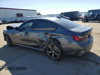 2022 BMW 3 Series 330i with VIN 3MW5R1J01N8C26963, listed as a Copart auction lot 45590415 with 37,441 mi miles and Salvage Title. Bid and sale history available at carsss.com. Image 2.