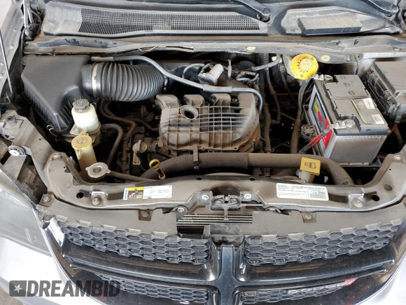 2016 Dodge Grand Caravan SE with VIN 2C4RDGBG2GR196537, listed as a Copart auction lot 52183835 with 136,556 mi miles and Clean Title. Bid and sale history available at DreamBid. Image 12.