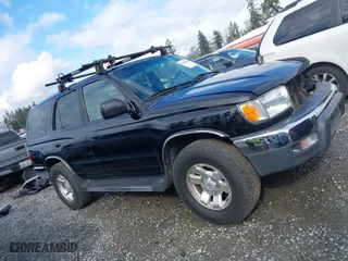 2000 Toyota 4Runner SR5 with VIN JT3HN86R1Y0322493, listed as a IAAI auction lot 41938857 with 121,124 mi miles. Bid and sale history available at carsss.com. Image 14.