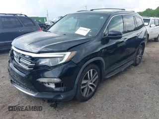 2017 Honda Pilot Touring with VIN 5FNYF5H99HB037126, listed as a IAAI auction lot 42275048 with 164,289 mi miles and . Bid and sale history available at DreamBid. Image 17.