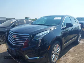 2017 Cadillac XT5 Platinum AWD with VIN 1GYKNFRS6HZ130626, listed as a IAAI auction lot 42470536 with 128,129 mi miles and . Bid and sale history available at DreamBid. Image 2.