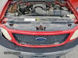 2003 Ford F-150 XL z VIN 1FTRX18L33NB73770, wystawiony jako Copart lot #59021845 z przebiegiem 344 989 mil mil oraz Szkoda całkowita • Salvage title. Historia ofert i sprzedaży dostępna na DreamBid. Obrazek 11.