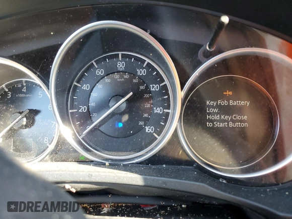2020 Mazda CX-5 Touring with VIN JM3KFACM0L0770254, listed as a Copart auction lot 71066824 with 0 mi miles and Salvage Title. Bid and sale history available at carsss.com. Image 9.