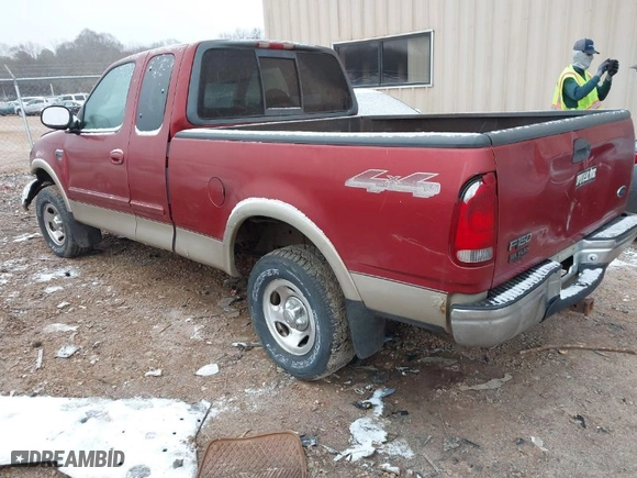 2000 Ford F-150 XL with VIN 1FTRX18L6YNA92785, listed as a IAAI auction lot 41618404 with 136,991 mi miles. Bid and sale history available at carsss.com. Image 3.
