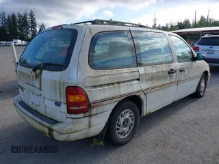 1996 Ford Windstar LX z VIN 2FMDA5142TBA56761, wystawiony jako IAAI lot #42217567 z przebiegiem 148 524 mil mil oraz . Historia ofert i sprzedaży dostępna na DreamBid. Obrazek 4.