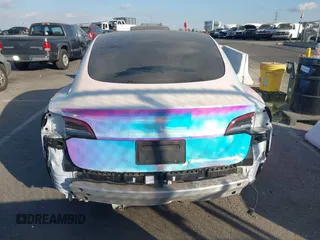 2021 Tesla Model 3 Long Range with VIN 5YJ3E1EB6MF053940, listed as a IAAI auction lot 41344978 with 38,544 mi miles and . Bid and sale history available at DreamBid. Image 16.