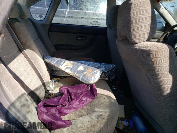 2000 Subaru Legacy L with VIN 4S3BE6353Y7216836, listed as a Copart auction lot 77437624 with Not provided miles and Salvage title. Bid and sale history available at DreamBid. Image 10.