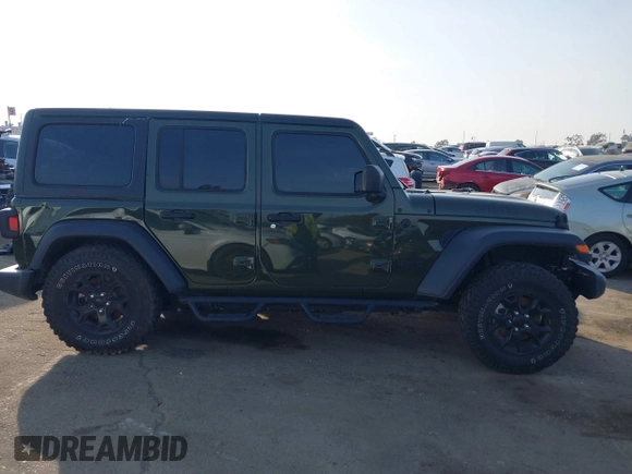2022 Jeep Wrangler Unlimited High Tide with VIN 1C4HJXDG5NW113205, listed as a IAAI auction lot 41488724 with 30,446 mi miles and . Bid and sale history available at DreamBid. Image 14.