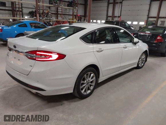 2017 Ford Fusion SE with VIN 3FA6P0H7XHR355914, listed as a IAAI auction lot 41983458 with 118,403 mi miles. Bid and sale history available at carsss.com. Image 4.