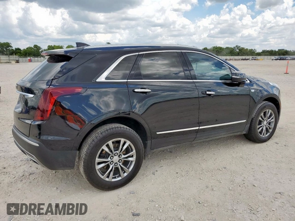 2021 Cadillac XT5 FWD Premium Luxury with VIN 1GYKNCRS0MZ100515, listed as a Copart auction lot 62856785 with 50,298 mi miles and Salvage title. Bid and sale history available at DreamBid. Image 3.