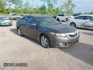 2009 Acura TSX with VIN JH4CU26649C028998, listed as a IAAI auction lot 42014953 with 191,712 mi miles. Bid and sale history available at carsss.com. Image 1.