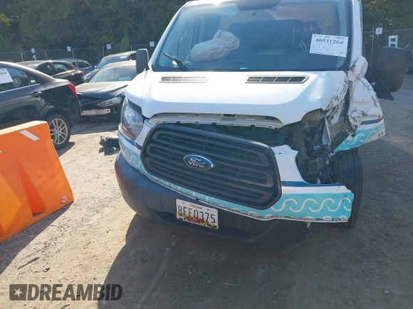 2015 Ford Transit Cargo with VIN 1FTNE1YG1FKA30488, listed as a IAAI auction lot 40531264 with 140,244 mi miles and . Bid and sale history available at DreamBid. Image 13.