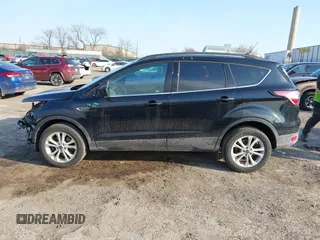 2018 Ford Escape SE z VIN 1FMCU9GD9JUC25456, wystawiony jako IAAI lot #41721436 z przebiegiem 55 642 mil mil oraz . Historia ofert i sprzedaży dostępna na DreamBid. Obrazek 15.