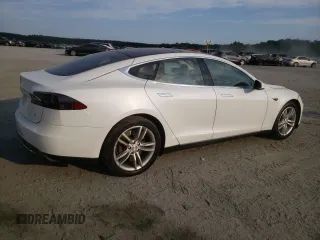 2014 Tesla Model S 60 с VIN 5YJSA1H18EFP33284, выставлен на аукционе Copart как лот 57434905 с пробегом 156 750 миль миль и Списание • Salvage title. История ставок и продаж доступна на DreamBid. Изображение 3.