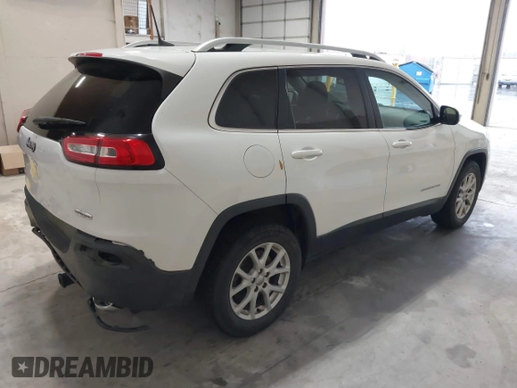 2016 Jeep Cherokee Latitude with VIN 1C4PJMCS5GW341286, listed as a IAAI auction lot 40723940 with 113,040 mi miles and . Bid and sale history available at DreamBid. Image 4.