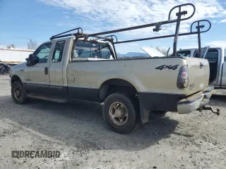2000 Ford F-250 XL with VIN 1FTNX21F1YEA83615, listed as a Copart auction lot 49978775 with 198,382 mi miles and Salvage title. Bid and sale history available at DreamBid. Image 2.