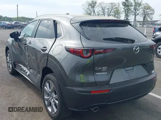 2024 Mazda CX-30 S Carbon Edition with VIN 3MVDMBCM5RM665341, listed as a IAAI auction lot 42180459 with 4,496 mi miles and . Bid and sale history available at DreamBid. Image 3.
