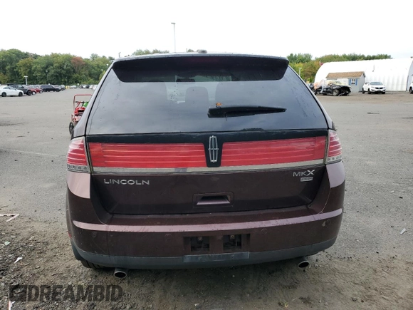 2010 Lincoln MKX with VIN 2LMDJ8JC9ABJ30736, listed as a Copart auction lot 71791594 with 116,083 mi miles and Salvage Title. Bid and sale history available at DreamBid. Image 6.