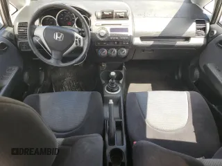 2007 Honda Fit Sport with VIN JHMGD37617S043208, listed as a Copart auction lot 64594825 with 210,672 mi miles and Clean title. Bid and sale history available at DreamBid. Image 8.