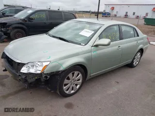 2006 Toyota Avalon XL with VIN 4T1BK36B96U159352, listed as a IAAI auction lot 41828327 with 233,158 mi miles. Bid and sale history available at carsss.com. Image 2.