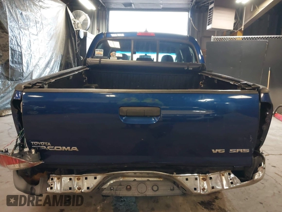 2014 Toyota Tacoma with VIN 3TMLU4EN4EM156933, listed as a IAAI auction lot 41197904 with 128,183 mi miles. Bid and sale history available at carsss.com. Image 6.
