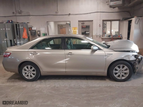 2009 Toyota Camry Hybrid with VIN JTNBB46K793052834, listed as a IAAI auction lot 41795017 with 243,223 mi miles. Bid and sale history available at carsss.com. Image 13.