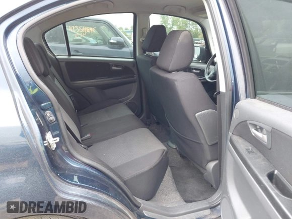 2009 Suzuki SX4 Sport FWD z VIN JS2YC414196200260, wystawiony jako IAAI lot #42354835 z przebiegiem 175 909 mil mil oraz . Historia ofert i sprzedaży dostępna na DreamBid. Obrazek 8.