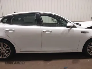 2016 Kia Optima SXL Turbo with VIN 5XXGV4L21GG073147, listed as a IAAI auction lot 41504517 with 130,467 mi miles. Bid and sale history available at carsss.com. Image 13.