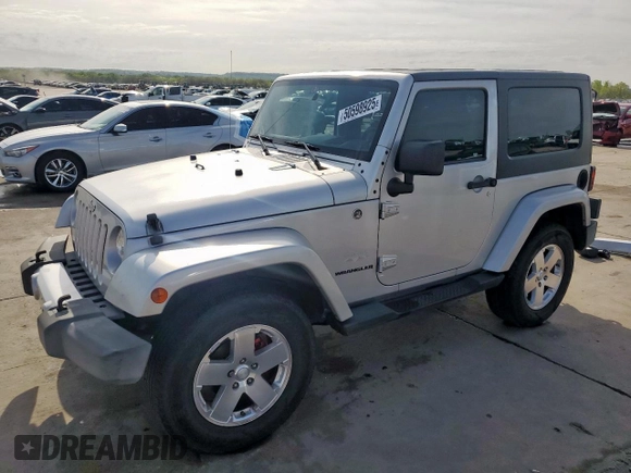2009 Jeep Wrangler Sahara z VIN 1J4FA54169L780809, wystawiony jako Copart lot #50598925 z przebiegiem 121 078 mil mil oraz Szkoda całkowita • Salvage title. Historia ofert i sprzedaży dostępna na DreamBid. Obrazek 1.