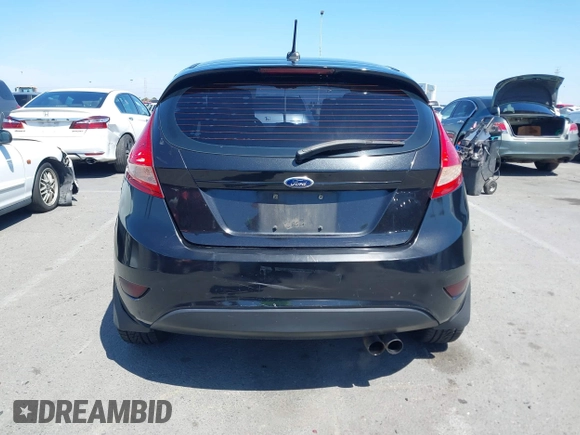 2011 Ford Fiesta SES with VIN 3FADP4FJ9BM181965, listed as a IAAI auction lot 42092140 with 150,304 mi miles. Bid and sale history available at carsss.com. Image 17.