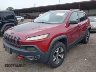 2015 Jeep Cherokee Trailhawk with VIN 1C4PJMBS6FW575517, listed as a IAAI auction lot 42661199 with 299,166 mi miles and . Bid and sale history available at DreamBid. Image 17.