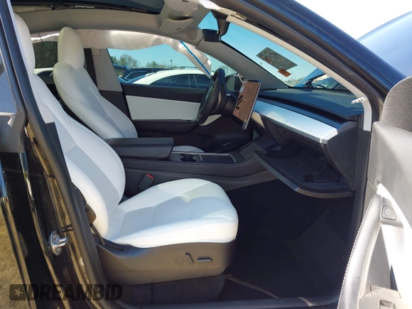 2021 Tesla Model Y Performance with VIN 5YJYGDEF6MF252877, listed as a IAAI auction lot 41770770 with 58,550 mi miles and . Bid and sale history available at DreamBid. Image 5.