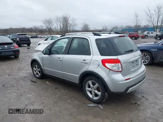 2007 Suzuki SX4 Man Touring Pkg AWD with VIN JS2YB417475102405, listed as a IAAI auction lot 41106931 with 170,315 mi miles. Bid and sale history available at carsss.com. Image 3.