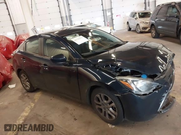 2016 Scion iA z VIN 3MYDLBZV5GY103533, wystawiony jako IAAI lot #41756270 z przebiegiem 59 290 mil mil oraz . Historia ofert i sprzedaży dostępna na DreamBid. Obrazek 13.