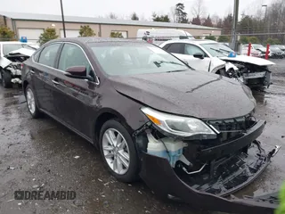 2013 Toyota Avalon XLE with VIN 4T1BK1EB2DU025799, listed as a IAAI auction lot 41695106 with 105,986 mi miles and . Bid and sale history available at DreamBid. Image 1.